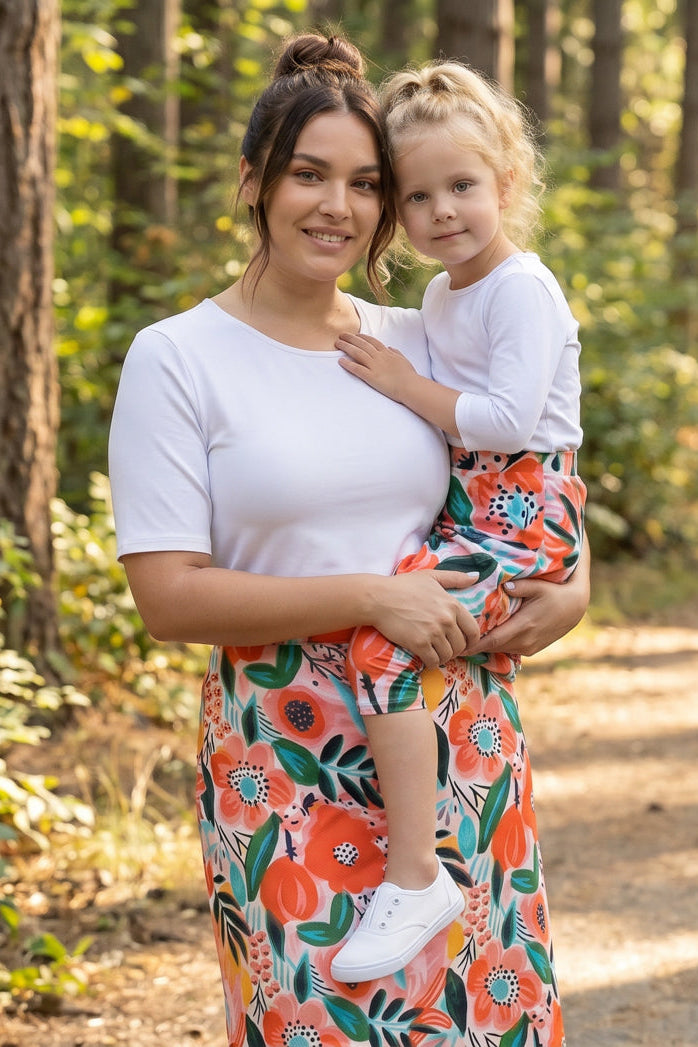 Model wearing Nuggles® Girls All-Sport Skirt in Summer Tropic