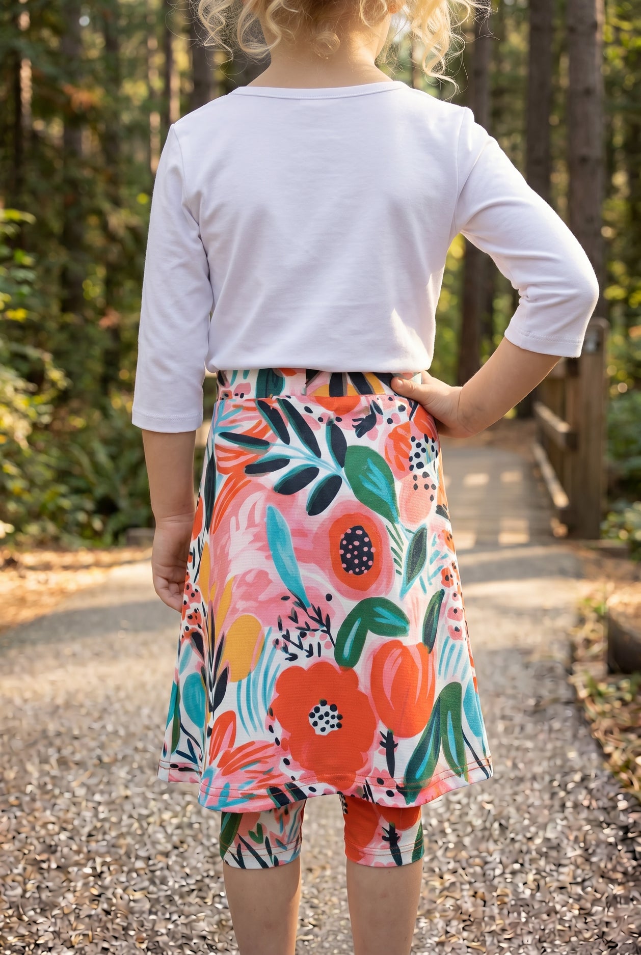 Model wearing Nuggles® Girls All-Sport Skirt in Summer Tropic