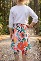 Model wearing Nuggles® Girls All-Sport Skirt in Summer Tropic