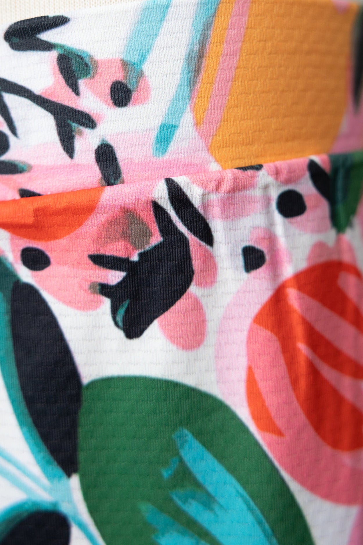 Model wearing Nuggles® Girls All-Sport Skirt in Summer Tropic