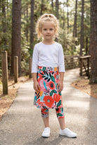Model wearing Nuggles® Girls All-Sport Skirt in Summer Tropic
