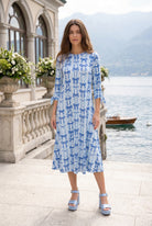 Model wearing Nuggles® Gracie Dress in Sweet Bows