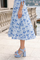 Model wearing Nuggles® Gracie Dress in Sweet Bows