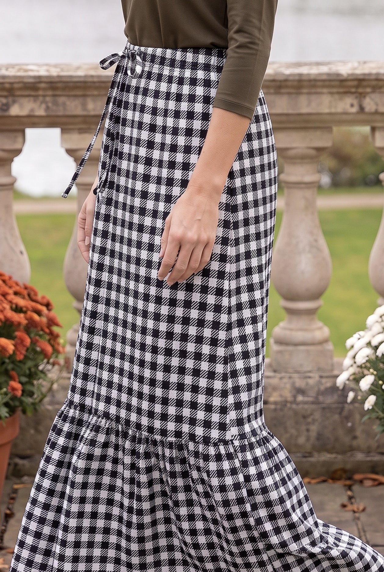 Model wearing Nuggles®  Sage Skirt in Sweet Gingham