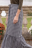 Model wearing Nuggles®  Sage Skirt in Sweet Gingham