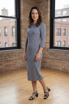 Model wearing Nuggles® Midi Layering Dress in Tailored Navy