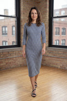 Model wearing Nuggles® Midi Layering Dress in Tailored Navy