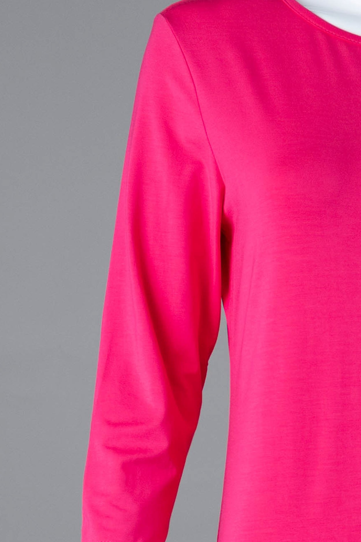 Model wearing Nuggles® Tea Layering Dress in Hot Pink