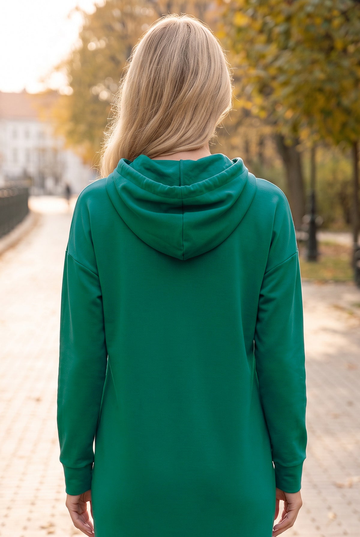 Model wearing Nuggles®   Hoodie Dress in Teal Green