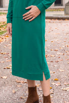 Model wearing Nuggles®   Hoodie Dress in Teal Green