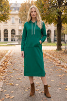 Model wearing Nuggles®   Hoodie Dress in Teal Green