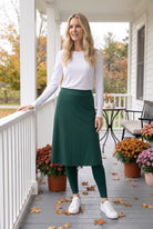 Model wearing Nuggles® Tilly Sport Skirt in Teal Green