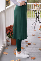 Model wearing Nuggles® Tilly Sport Skirt in Teal Green