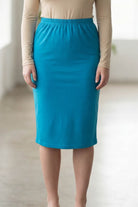 Model wearing Nuggles® 27" Classic Skirt  in Turquoise
