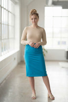 Model wearing Nuggles® 27" Classic Skirt  in Turquoise
