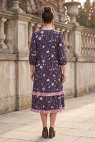 Nuggles® Patricia Dress in Twilight Garden, full-length back view showing the relaxed fit and ruffle tiers