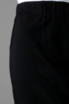 Model wearing Nuggles® 31" Pocket Classic Skirt in Black