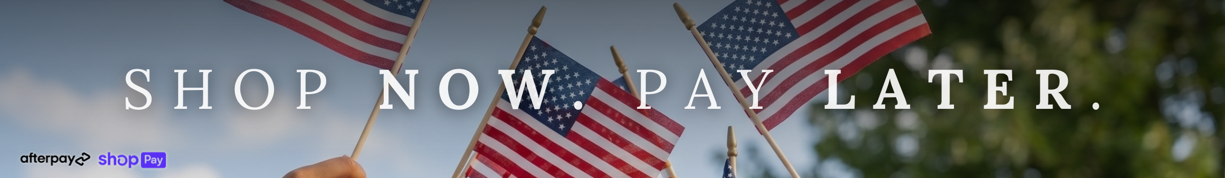 A picture of small American Flags with the words "shop now. pay later."