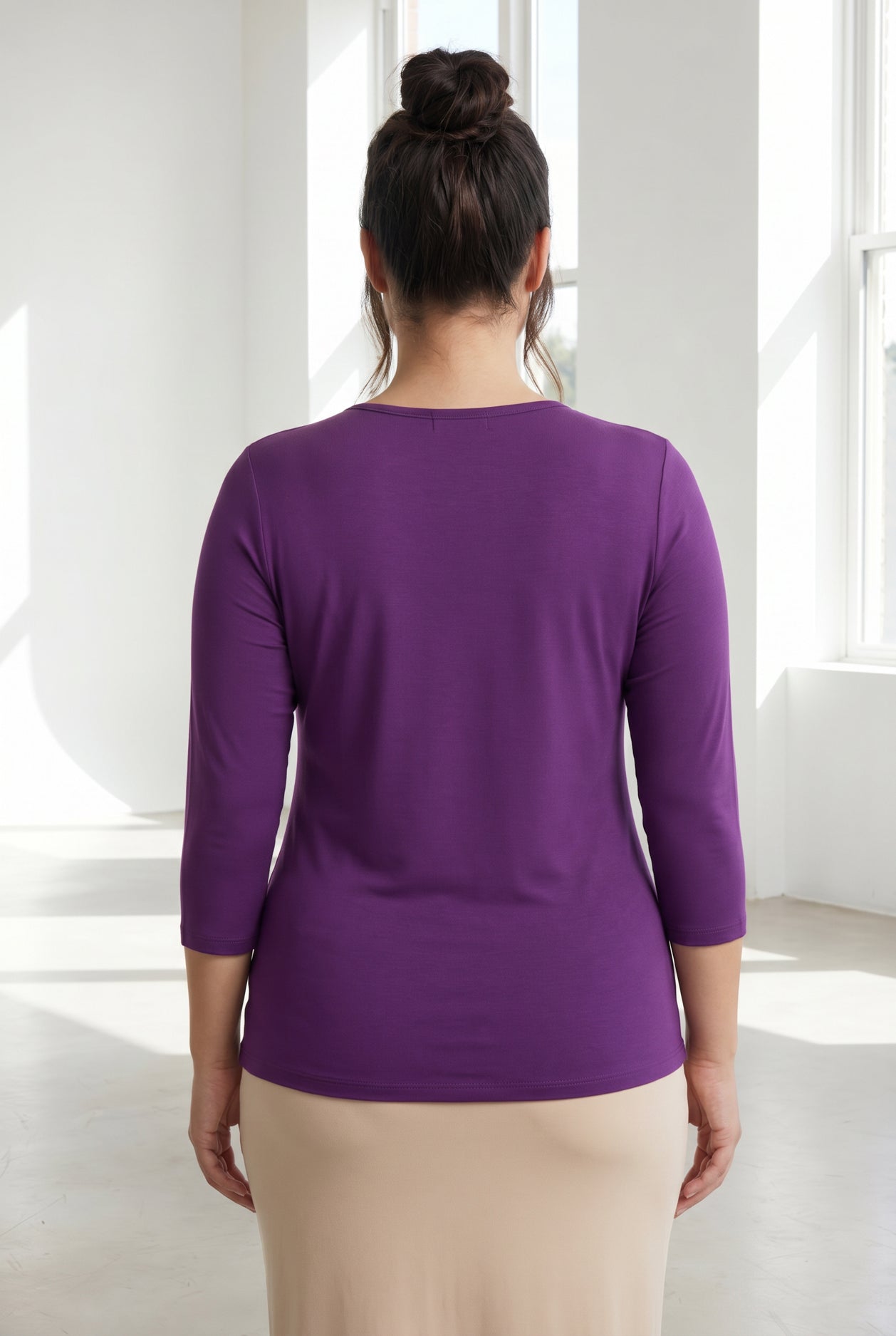 Model wearing Nuggles® 3/4 Essential Tee in  Violet