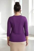 Model wearing Nuggles® 3/4 Essential Tee in  Violet