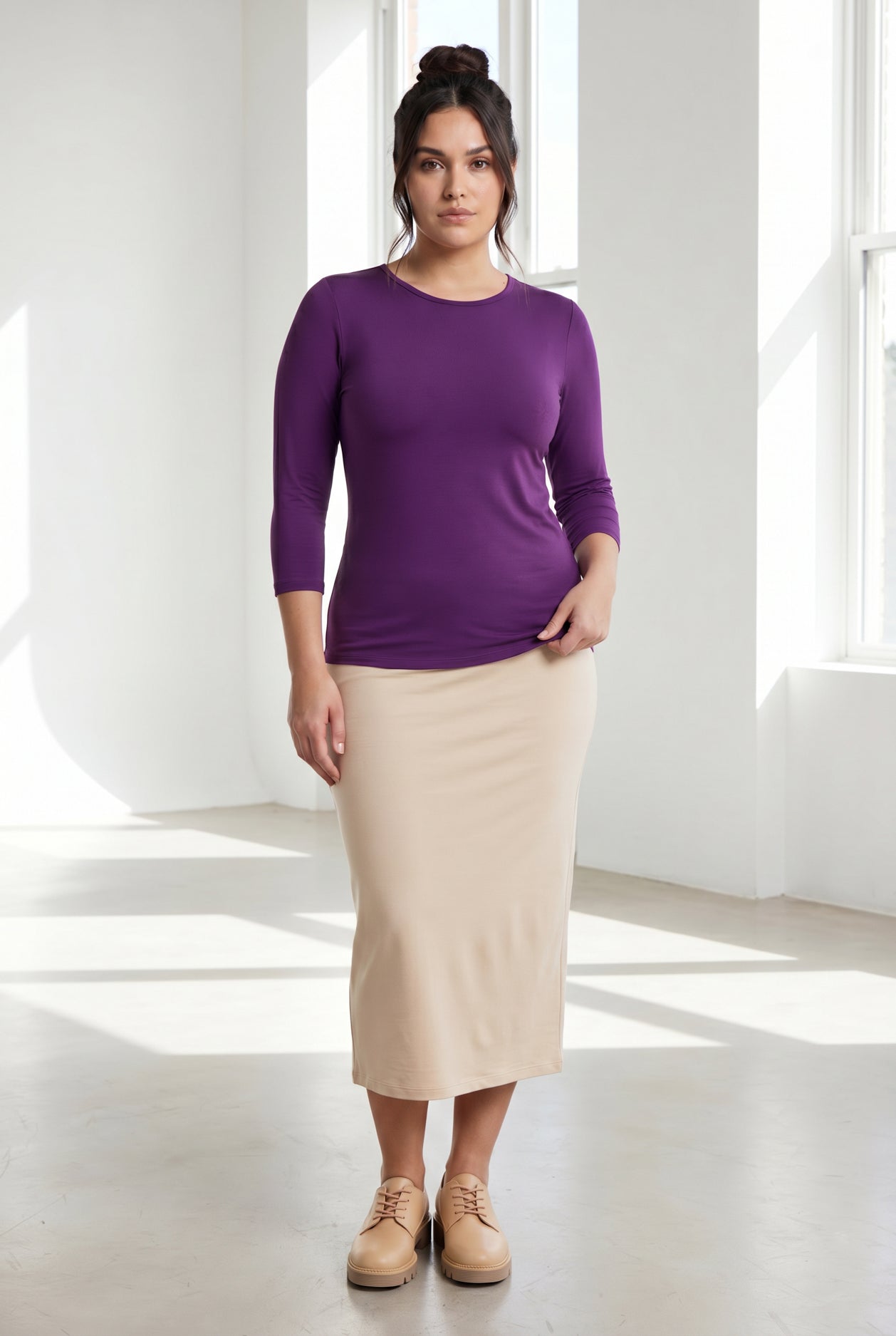 Model wearing Nuggles® 3/4 Essential Tee in  Violet