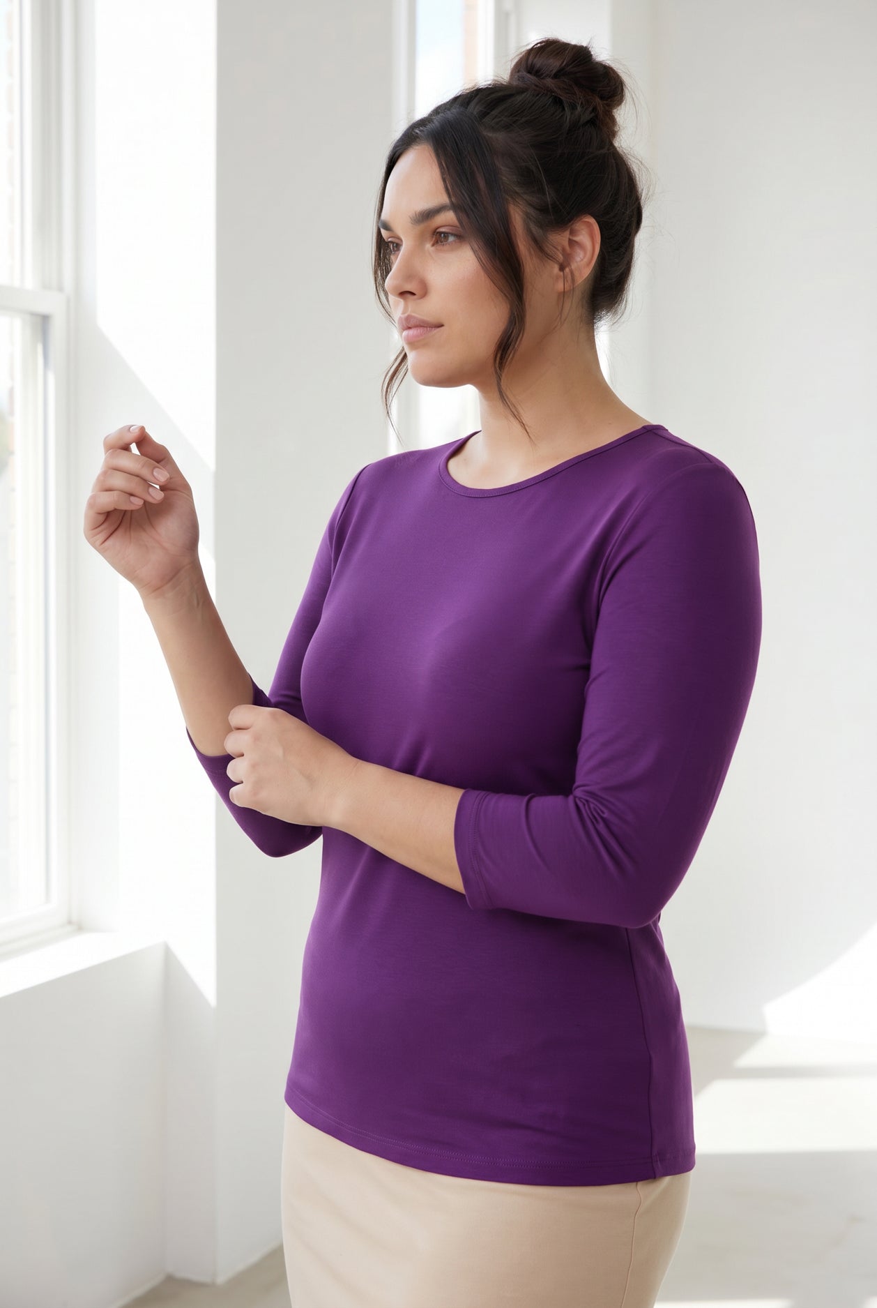 Model wearing Nuggles® 3/4 Essential Tee in  Violet