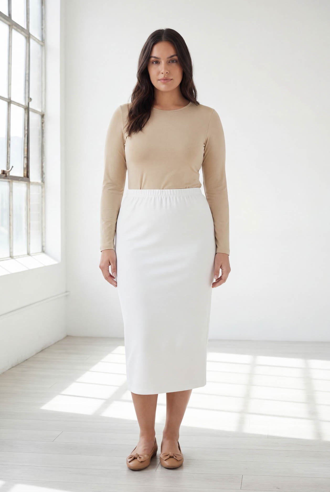 Model wearing Nuggles® 31" Classic Skirt  in White