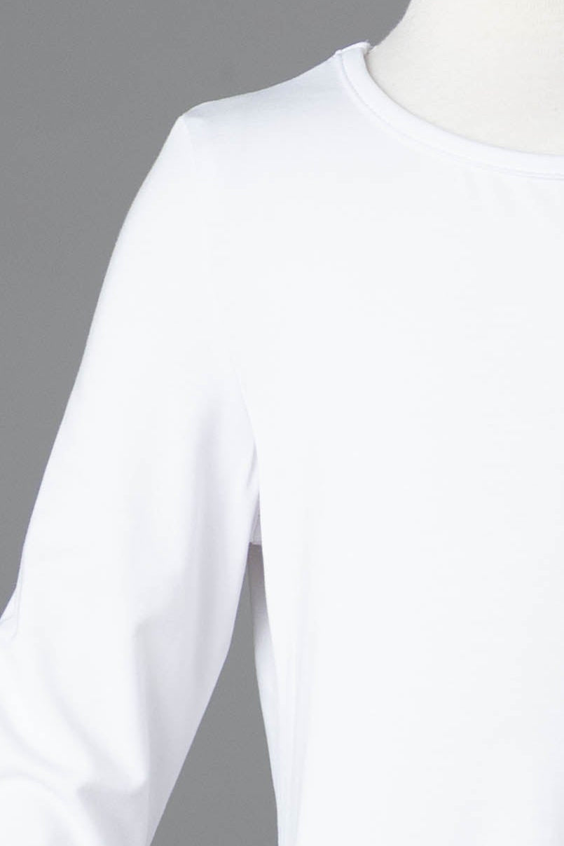 Model wearing Nuggles® Girls Midi Layering Dress in White