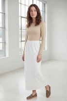 Model wearing Nuggles® 36" Classic Skirt  in White