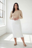 Model wearing Nuggles® 31" Classic Skirt  in White
