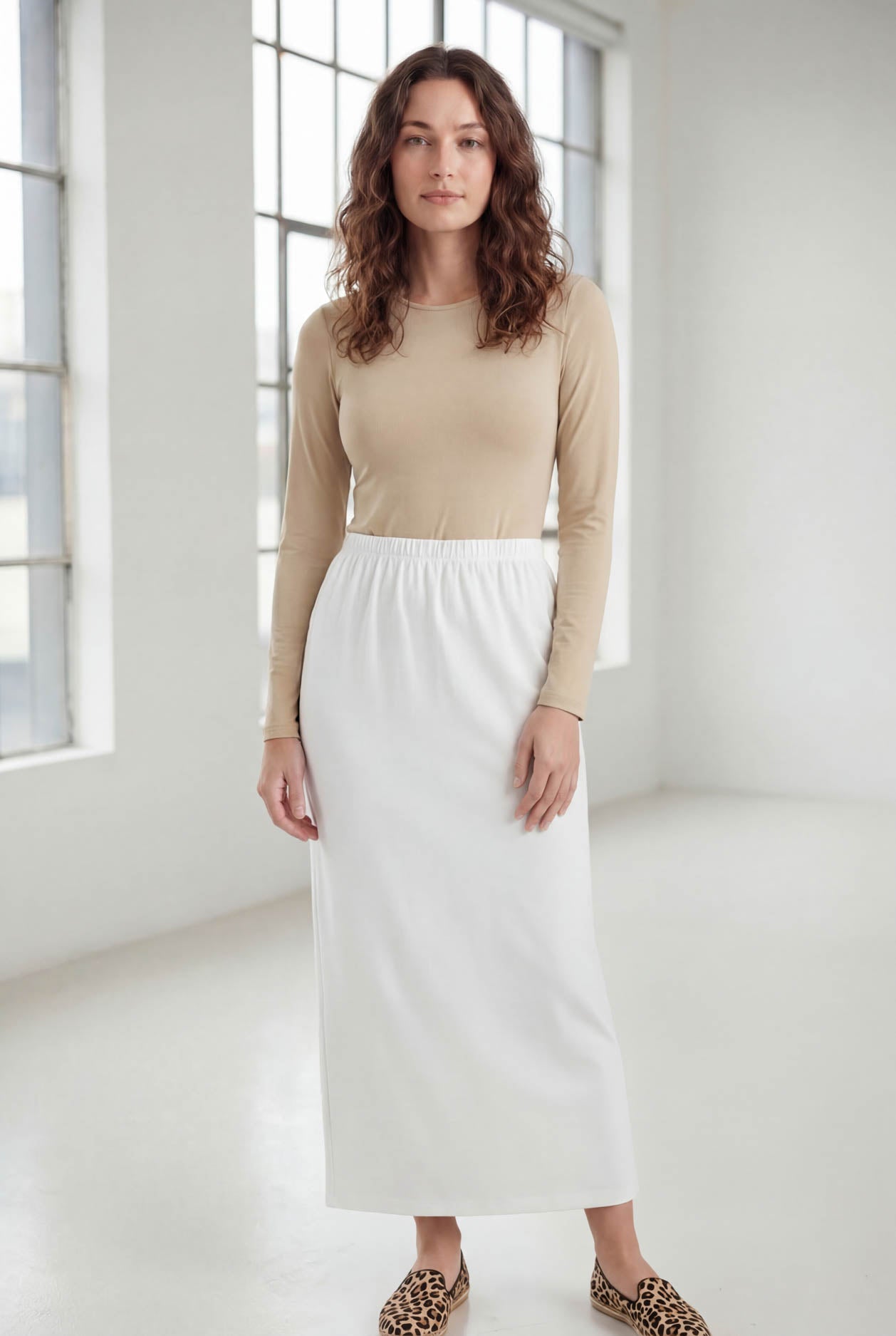 Model wearing Nuggles® 36" Classic Skirt  in White