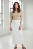 Model wearing Nuggles® 36" Classic Skirt  in White