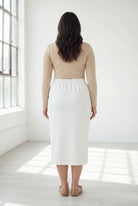 Model wearing Nuggles® 31" Classic Skirt  in White