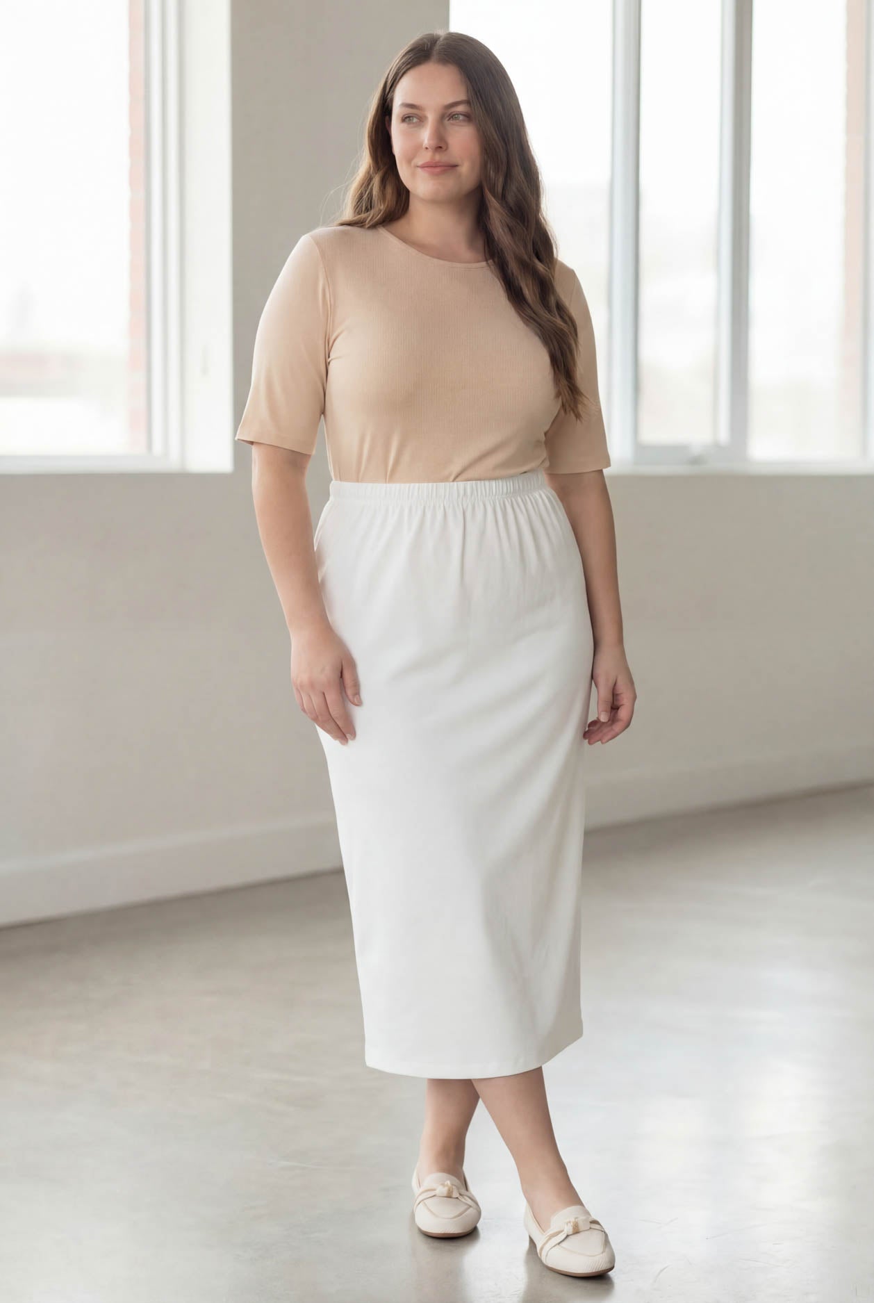 Model wearing Nuggles® 34" Classic Skirt  in White