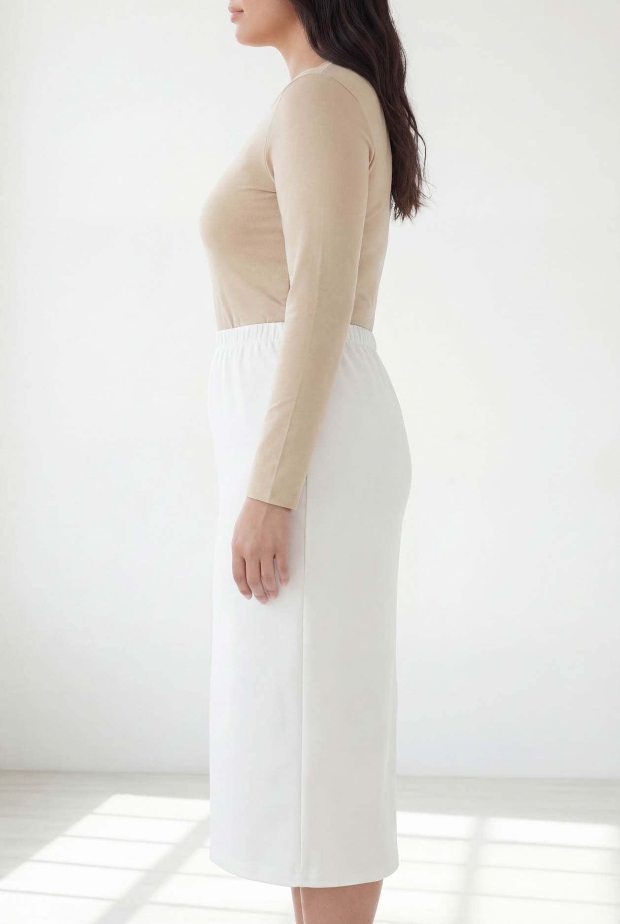 Model wearing Nuggles® 31" Classic Skirt  in White