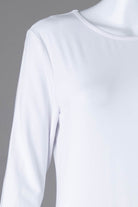 Model wearing Nuggles® Midi Layering Dress in White