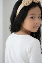 Model wearing the Girls' Nuggles® Essential 3/4 Tee in White