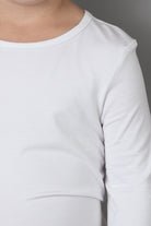 Model wearing the Girls' Nuggles® Essential 3/4 Tee in White