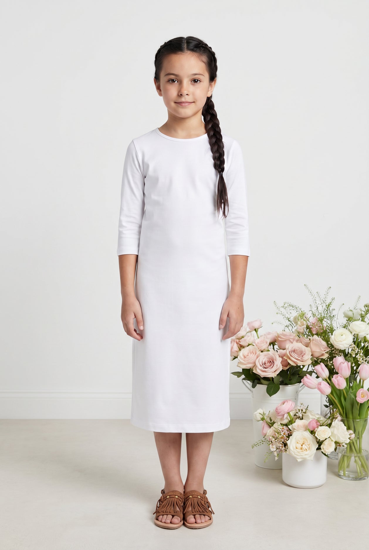 Model wearing Nuggles® Girls Midi Layering Dress in White