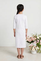 Model wearing Nuggles® Girls Midi Layering Dress in White
