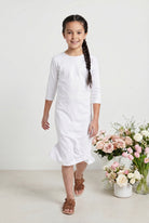 Model wearing Nuggles® Girls Midi Layering Dress in White