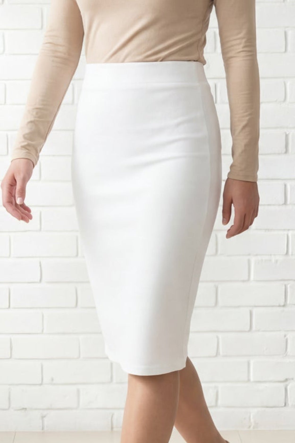 Model wearing Nuggles® 25" Relaxed Skirt in White