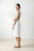 Model wearing Nuggles® 25" Relaxed Skirt in White