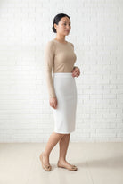 Model wearing Nuggles® 25" Relaxed Skirt in White