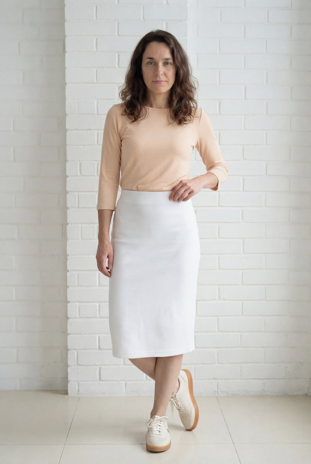 Model wearing Nuggles® 27" Relaxed Skirt in White