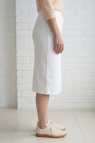Model wearing Nuggles® 27" Relaxed Skirt in White