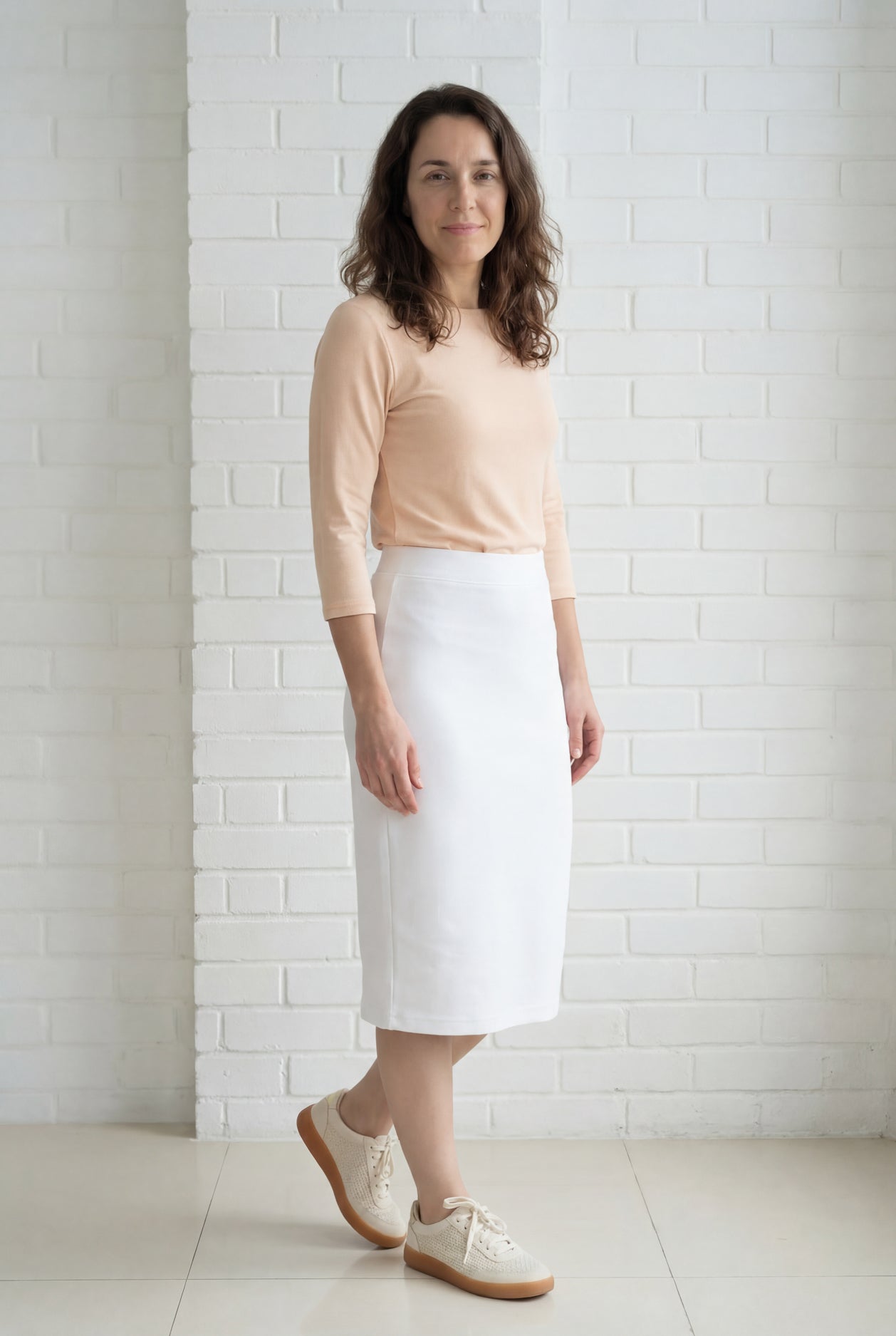 Model wearing Nuggles® 27" Relaxed Skirt in White