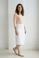 Model wearing Nuggles® 27" Relaxed Skirt in White