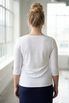 Model wearing the Nuggles® Essential 3/4 Tee in White