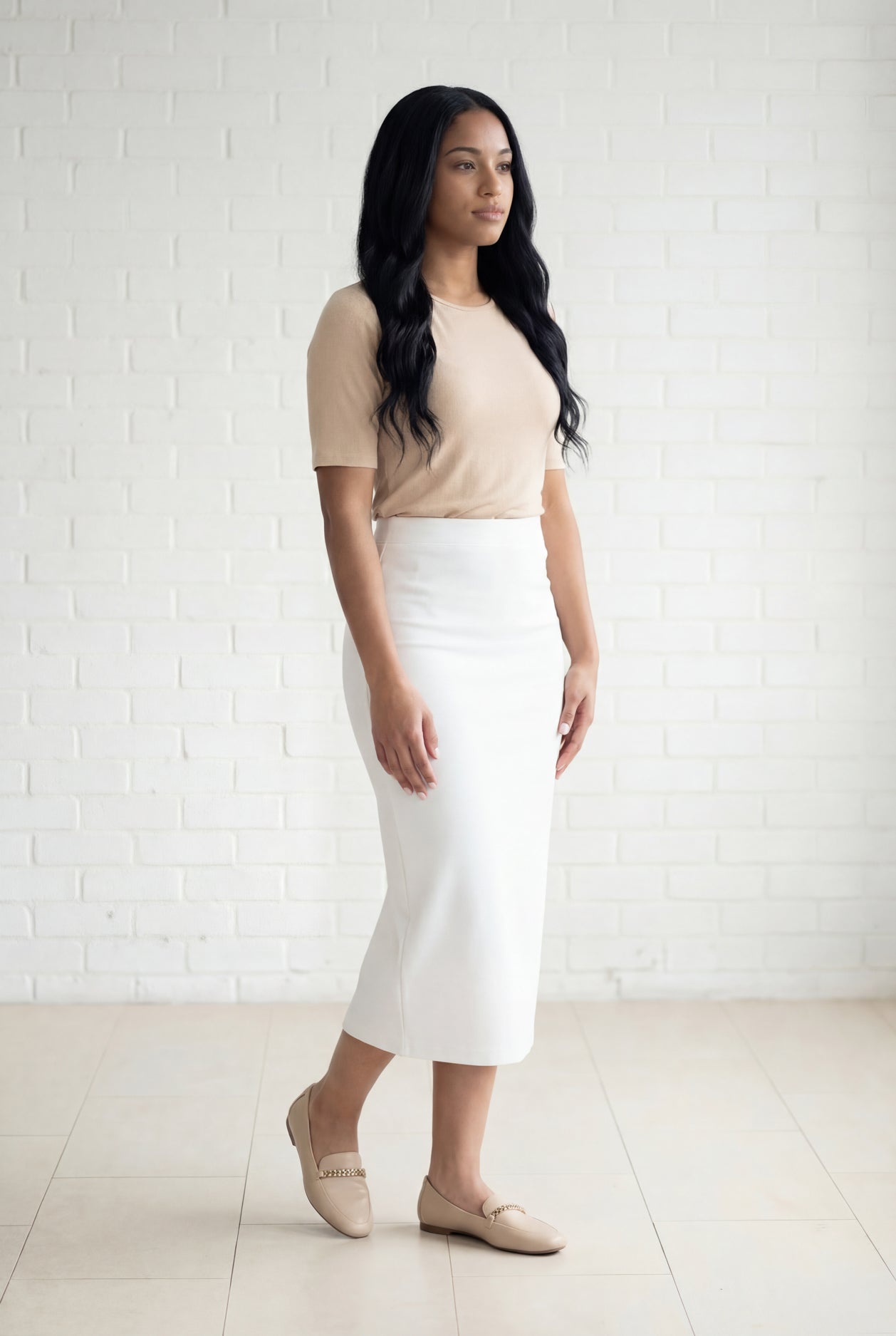 Model wearing Nuggles® 31" Relaxed Skirt in White